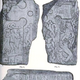 Thorwald’s Cross, a fragmented runestone depicting Odin being consumed.